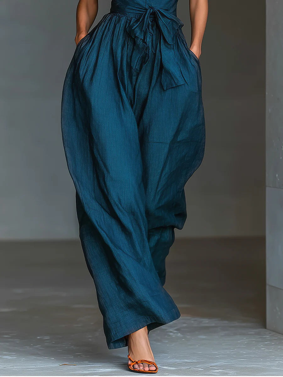 TIALDA | Jumpsuit mit Cross-Halter-Ausschnitt und weitem Bein